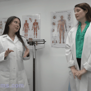 Two nurses talking in a doctor's office