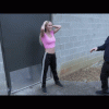 Buff Blondie gets arrested for exposing her belly in public. She is handcuffed and shackled and walked through a parking lot. Then taken to jail.